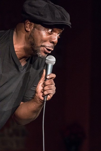 Black comedian at mike
