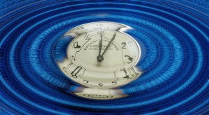 Clock under ripples of blue sound