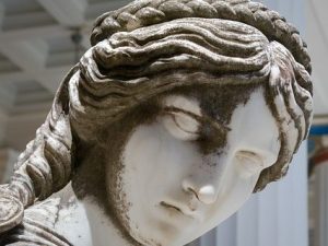 The head of a statue staring at you