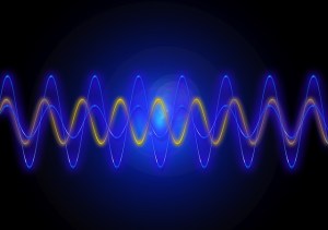 Blue and yellow sine wave patterns representing light