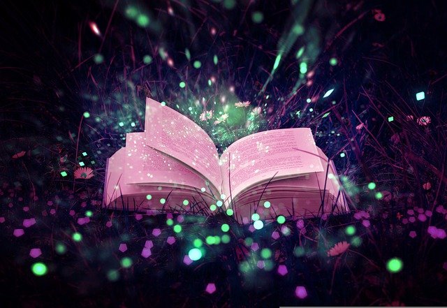 Magic book with sparkly green and purple colours