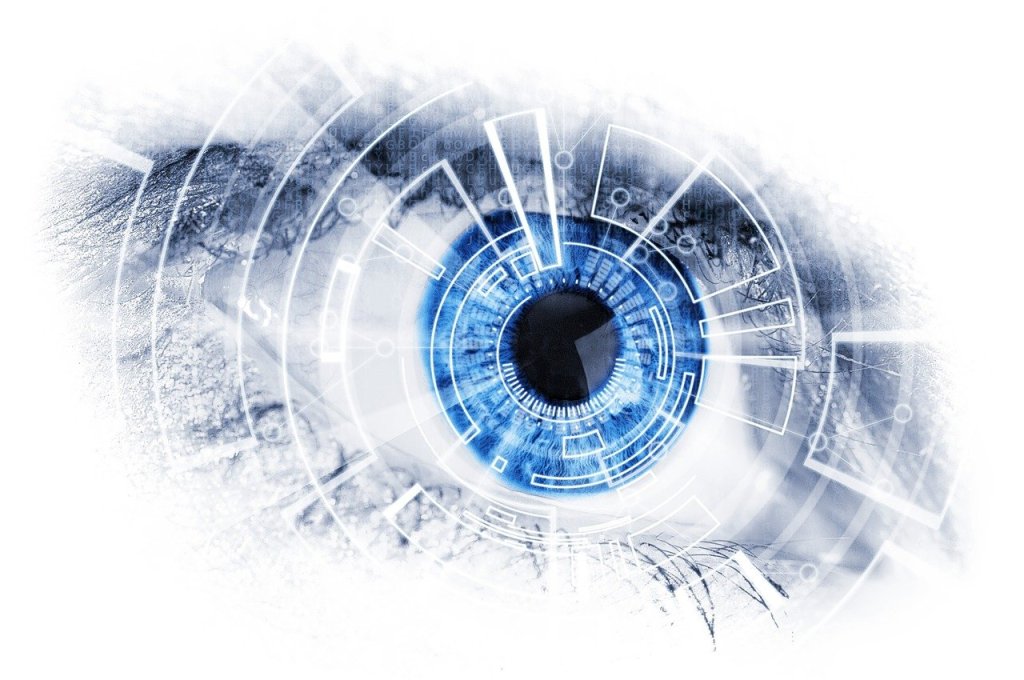 A human eye with iris picked out in bright blue and overlaid with a digital drawing.