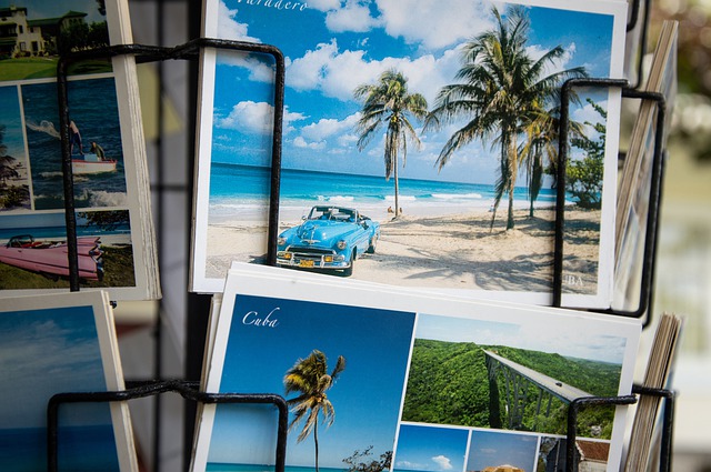 postcards of cuba in a rack