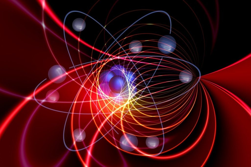 Anatom with swirling orbiting electrons and force lines
 Image by Gerd Altmann from Pixabay