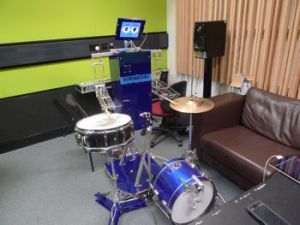 Mortimer, the robot, playing the drums