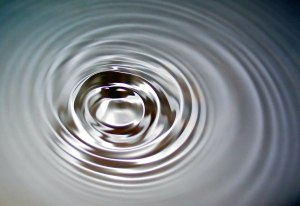 A silver ripple from a drop
