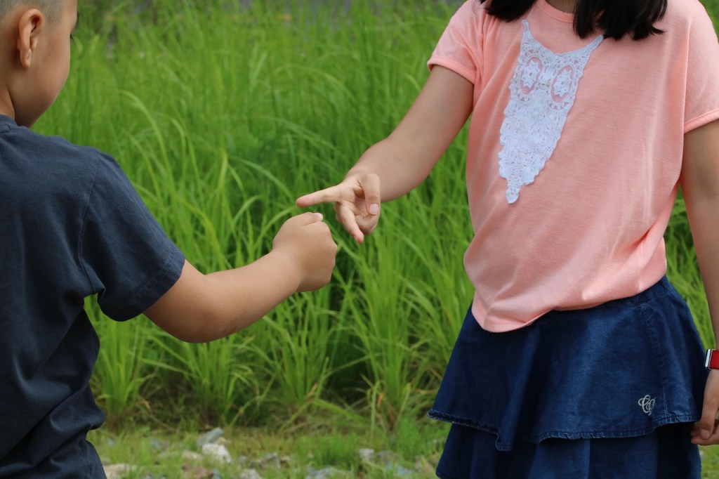 Children playing Rock Paper Scissors (Janken)