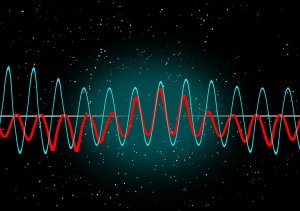 Two waves superiposed on a background of occasional noisy white spots.